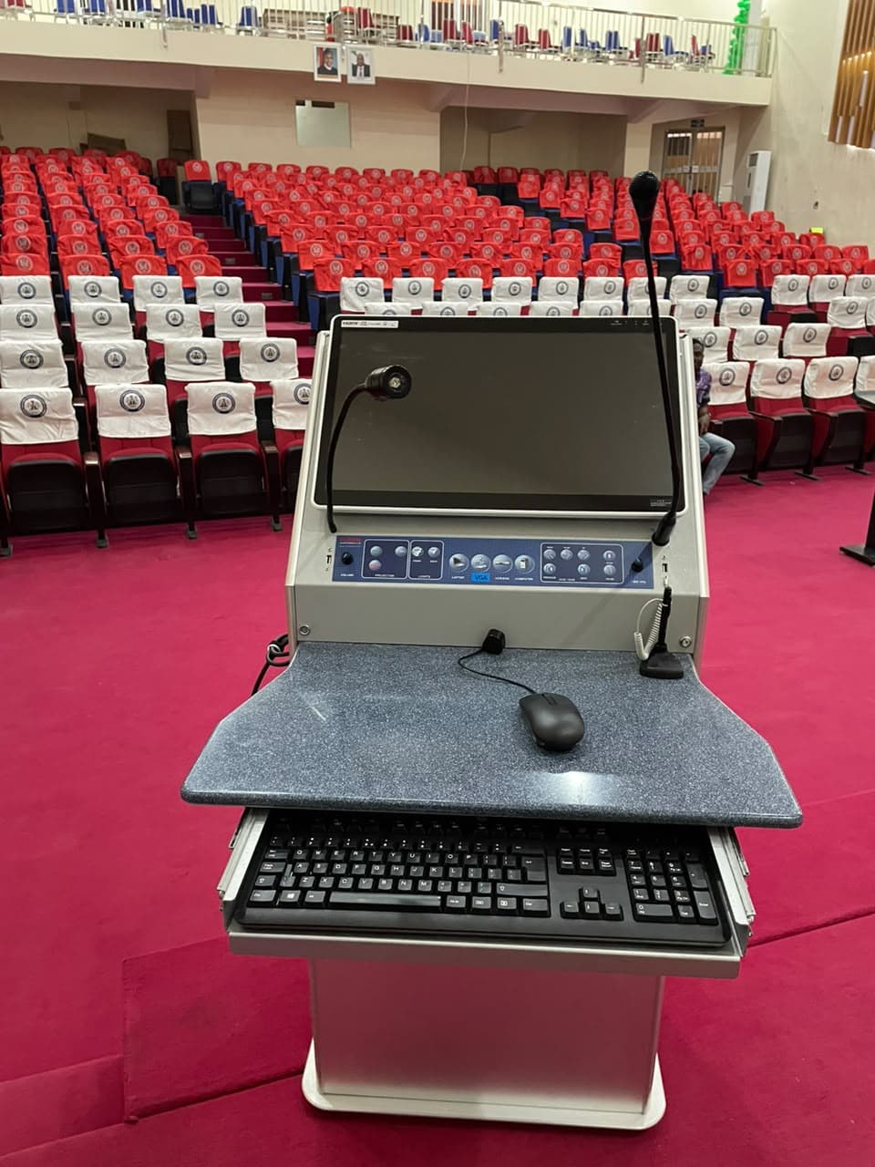 Lectern view toward tiered auditorium seating